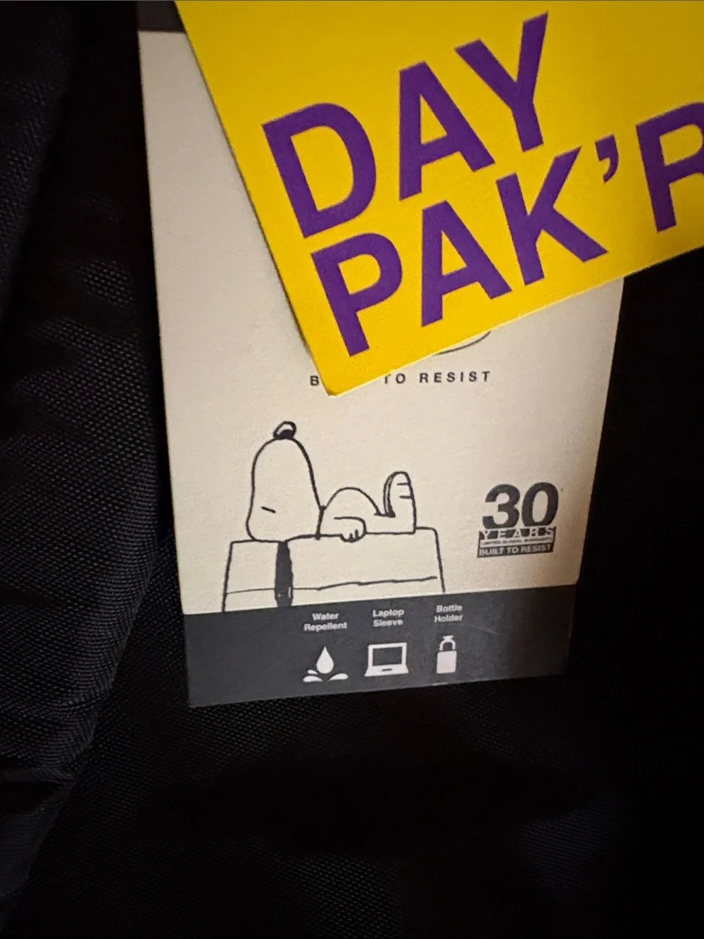 Eastpak Black Backpack with White Peanuts Graphic